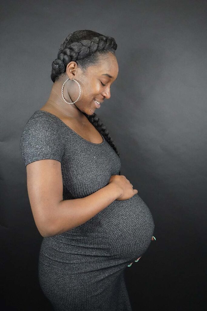 photo of woman pregnant with child